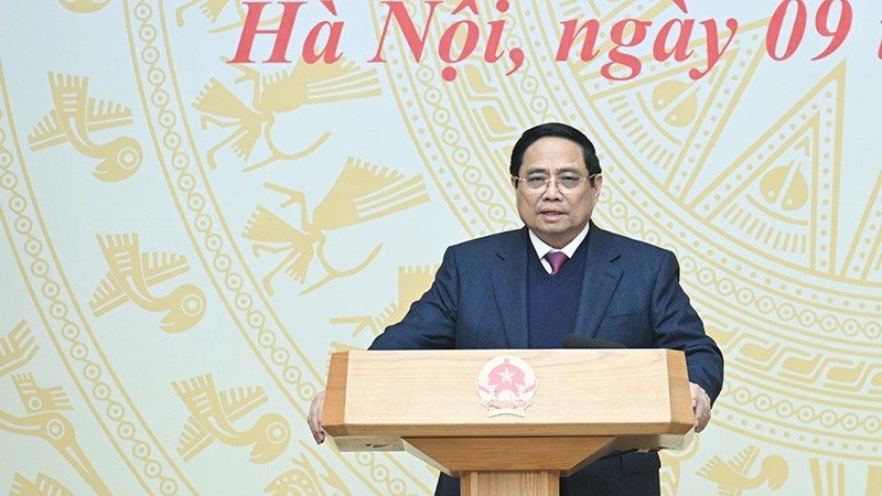 Премьер-министр Фам Минь Тьинь выступает на конференции. Фото: Чан Хай