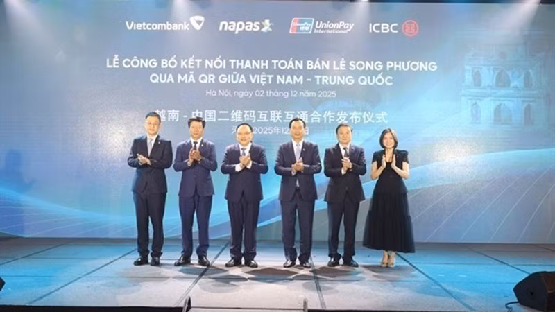 Церемония запуска системы розничных QR-платежей между Вьетнамом и Китаем. Фото предоставлено NAPAS