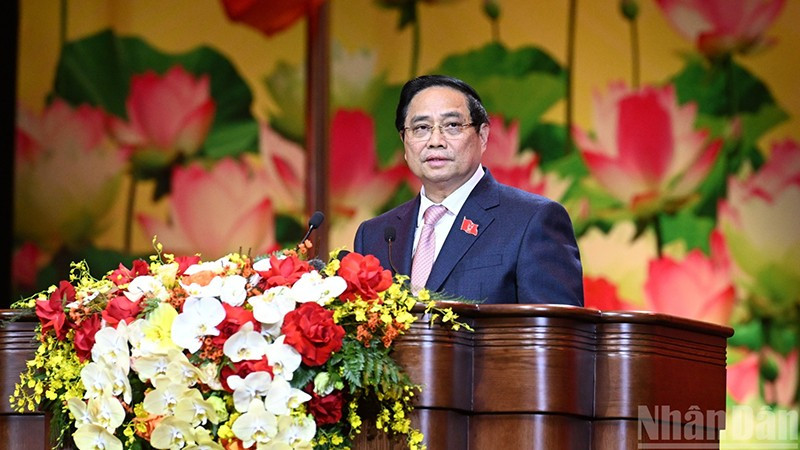 Премьер-министр Фам Минь Тьинь выступает на конференции. Фото: Чан Хай