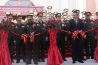 Делегаты разрезают ленту в знак открытия проекта. Фото: ВИА