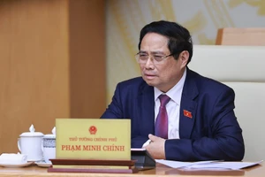 Премьер-министр Фам Минь Тьинь председательствует на 21-м заседании Национального руководящего комитета по предотвращению и борьбе с ННН-промыслом. (Фото: ВИА)