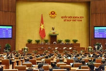 На 8-й сессии НС 14-го созыва было утверждена Резолюция о пилотировании организации модели городской администрации в Ханое. Фото: hanoimoi.com.vn