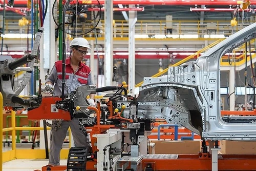 Вьетнам становится приоритетным направлением для многих иностранных предприятий. Фото: hanoimoi.vn