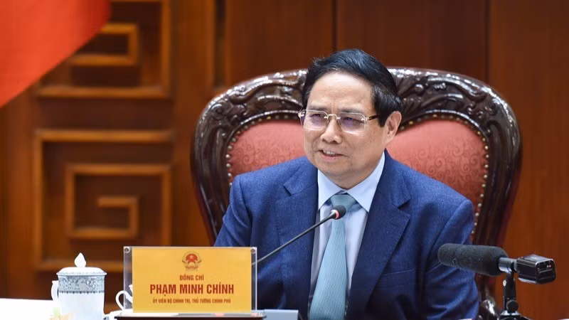 Премьер-министр Фам Минь Тьинь выступает на заседании. Фото: Чан Хай