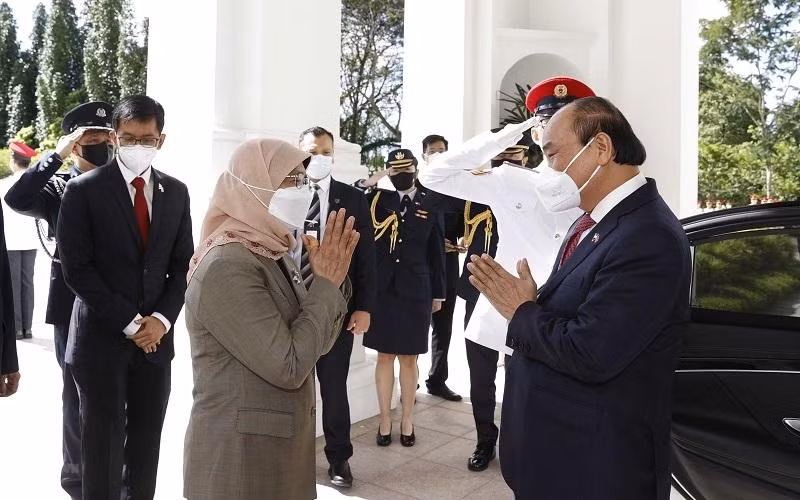 Президент Нгуен Суан Фук посетил Сингапур с государственным визитом в феврале 2022 года. Фото: VNA