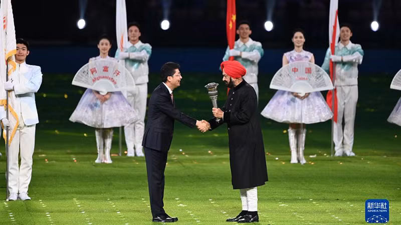 Церемония передачи факела ASIAD.