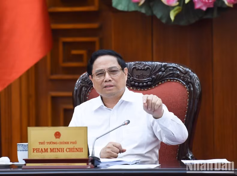 Премьер-министр Фам Минь Тьинь выступает с речью. Фото: Чан Хай