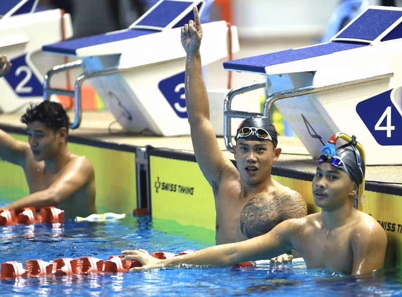 Ву Данг Нят Нам (в центре) выиграл золотую медаль в дайвинге. Фото: ВИА