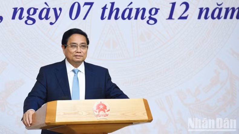 Премьер-министр Фам Минь Тьинь выступает с речью. Фото: Чан Хай Премьер-министр Фам Минь Тьинь выступает с речью. Фото: Чан Хай