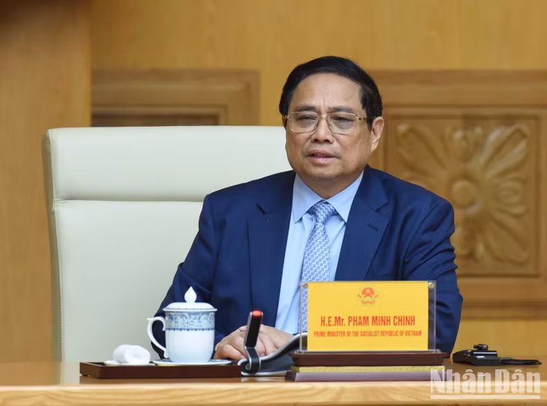 Премьер-министр Фам Минь Тьинь выступает с речью. Фото: Чан Хай