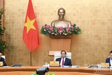 Премьер-министр Фам Минь Тьинь председательствует на специальном заседании правительства по вопросам законотворчества. (Фото: Чан Хай)