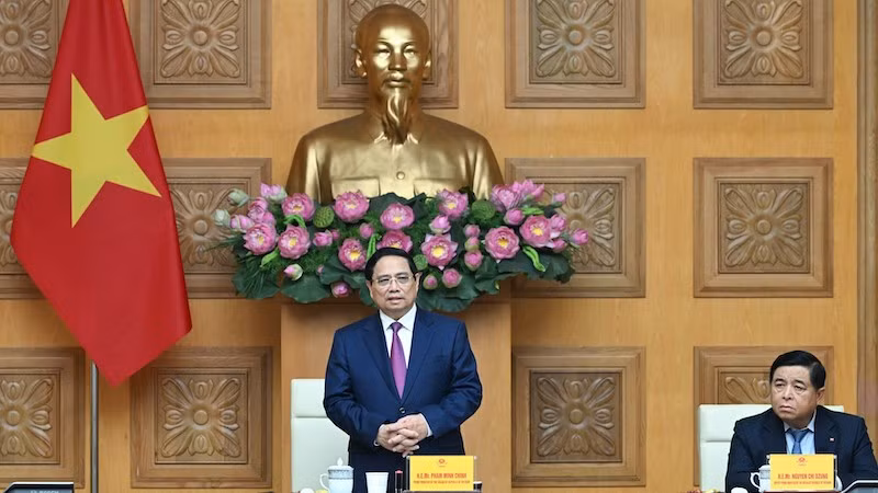 Премьер-министр Фам Минь Тьинь выступает на приеме. Фото: Чан Хай