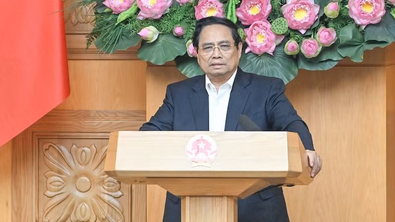 Премьер-министр Фам Минь Тьинь выступает на заседании. Фото: Чан Хай