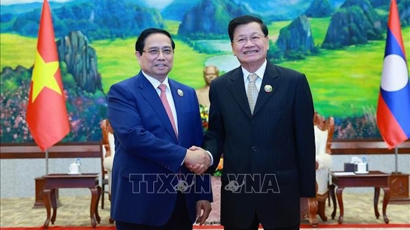 Премьер-министр Фам Минь Тьинь и Генеральный секретарь ЦК НРПЛ, Президент Лаоса Тхонглун Сисулит. Фото: ВИА