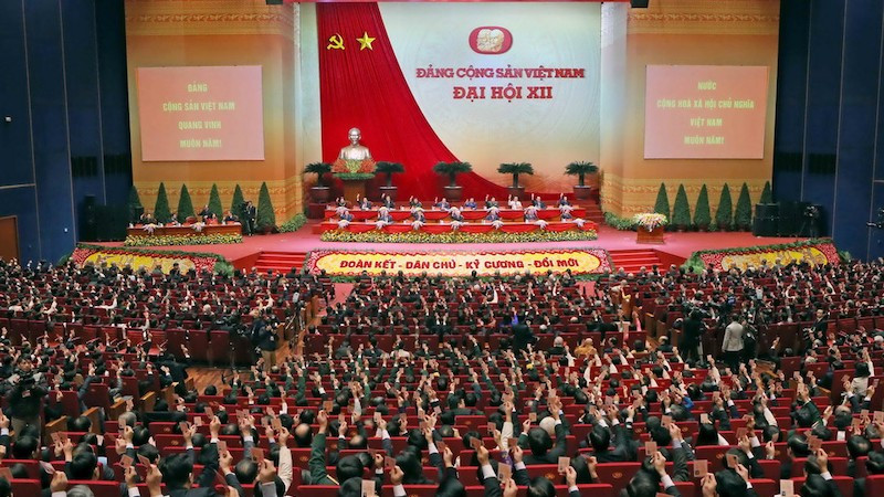 Делегаты голосуют за утверждение Резолюции XII съезда Партии. Фото: ВИА