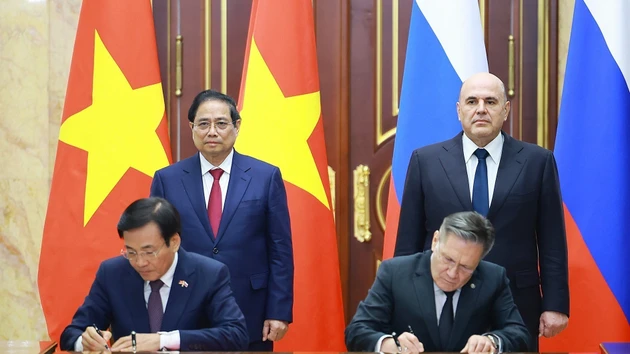 [Фото] Церемония подписания соглашения о сотрудничестве в строительстве атомной электростанции между Вьетнамом и Россией