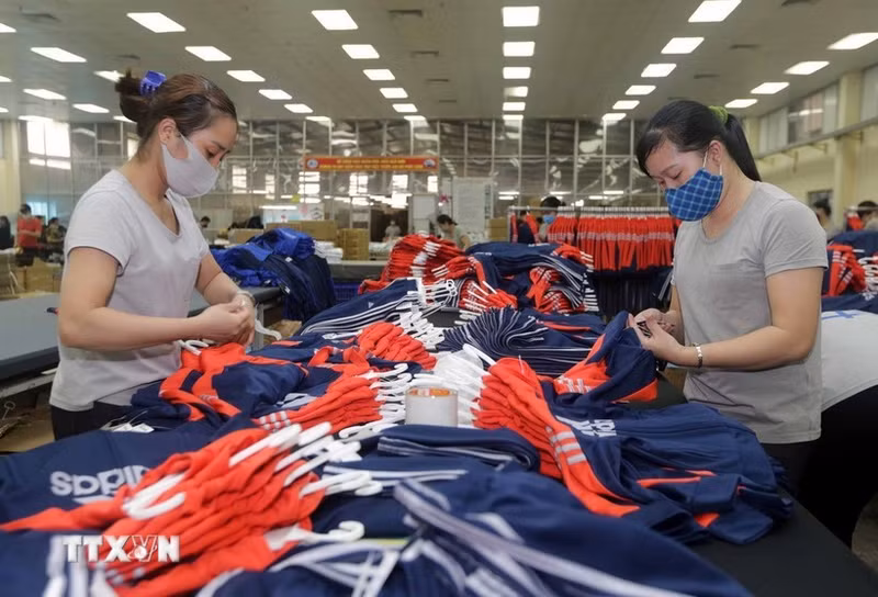 Пошив экспортной продукции в швейной компании «Тхайнгуен». (Фото: ВИА)