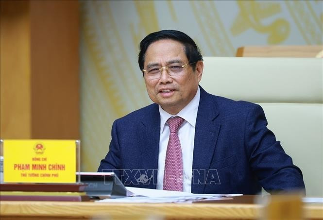 Премьер-министр Фам Минь Тьинь председательствует на первом заседании Руководящего комитета по управлению и регулированию макроэкономики. (Фото: ВИА)