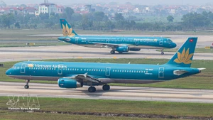 Самолёт авиакомпании Vietnam Airlines в одном из аэропортов Вьетнама. (Фото: Vietnam+)