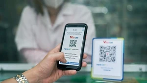 Цифровые платежи во Вьетнаме стремительно расширяются, а объём операций с QR-кодами вырос более чем на 150%. (Фото: ВИА)