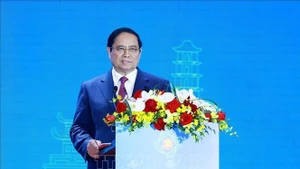 Премьер-министр Фам Минь Тьинь выступает на церемонии открытия 6-го Совещания министров АСЕАН по цифровым вопросам (ADGMIN). (Фото: ВИА)