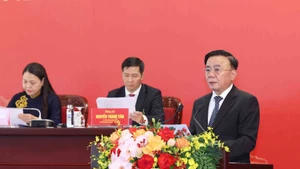 Постоянный член Секретариата Чан Кам Ту выступает на международной пресс-конференции, посвящённой XIV Всевьетнамскому партийному съезду КПВ. (Фото: ВИА)