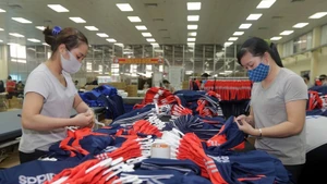 Пошив экспортной продукции в швейной компании «Тхайнгуен». (Фото: ВИА)