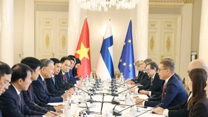 Генеральный секретарь То Лам и Президент Финляндской Республики Александр Стубб во время переговоров. (Фото: ВИА)
