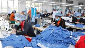 Производство швейной продукции на экспорт в Японию на швейной фабрике Hung Viet в провинции Хынгйен. (Фото: ВИА)