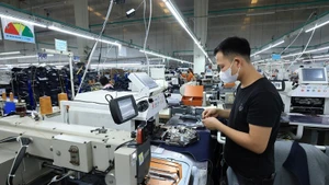 Предприятие по производству комплектующих для швейной продукции в промышленной зоне Камкхе, провинция Футхо. (Фото: ВИА)