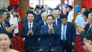 Премьер-министр Фам Минь Тьинь присутствовал на съезде. (Фото: ВИА)