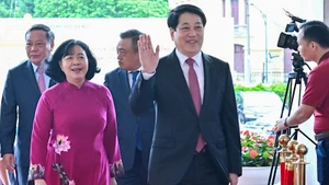 Президент Лыонг Кыонг принимает участие в мероприятии.