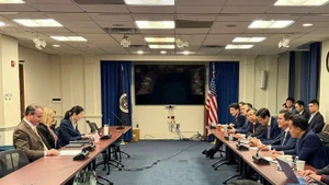 Участники официальной технической сессии переговоров между Вьетнамом и США. (Фото: ВИA)