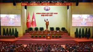 Заключительное заседание XIV Всевьетнамского съезда КПВ. (Фото: ВИА)