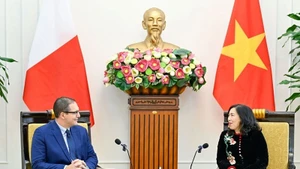 Заместитель министра иностранных дел Ле Тхи Тху Ханг и Постоянный заместитель министра иностранных дел и туризма Мальты Кристофер Кутаджар. (Фото: ВИА)