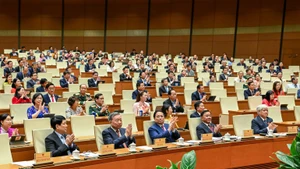 Руководители Партии и Государства, депутаты НС на закрытии сессии. Фото: Зюи Линь