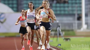 Нгуен Тхи Оань опережает соперниц на дистанции. (Фото: Хоанг Минь)