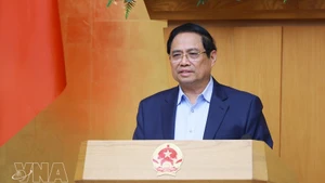 Премьер-министр Фам Минь Тьинь подводит итоги очередного заседания Правительства за февраль 2026 года. (Фото: ВИА)