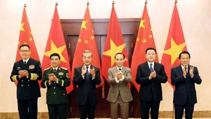 Министры иностранных дел, обороны и общественной безопасности Вьетнама и Китая на первом совещании в рамках стратегического диалога «3+3». Фото: ВИА