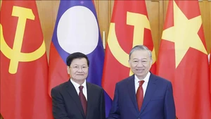 Генеральный секретарь ЦК КПВ То Лам и Генеральный секретарь ЦК НРПЛ, Президент Лаоса Тхонглун Сисулит во время государственного визита лаосского лидера во Вьетнам в январе 2026 года. Фото: ВИА
