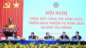 [Фото] Премьер-министр Фам Минь Тьинь принимает участие в конференции по постановке задач финансового сектора на 2026 год