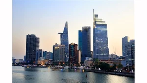 Динамично развивающийся и современный городской ландшафт Хошимина на берегах реки Сайгон. Фото: ВИА