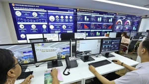 Интеллектуальный центр управления и мониторинга (IOC) Биньфыок, функционирующий с сентября 2020 года, эффективно выполняет важную роль в поддержке построения цифрового правительства. Фото: ВИА