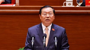 Товарищ Лай Суан Мон представляет доклад. Фото: ВИА