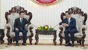 Вице-премьер Вьетнама Хо Дык Фок и Премьер-министр Лаоса Сонексай Сипхандон. Фото: ВИА