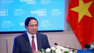 Премьер-министр Фам Минь Тьинь принимает представителей международного бизнеса в финансовой сфере. Фото: ВИА 