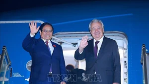 Премьер-министр Фам Минь Тьинь и Генеральный секретарь ООН Антониу Гутерриш. Фото: ВИА