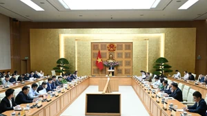 [Фото] Премьер-министр Фам Минь Тьинь провел заседание по развитию платформы данных во Вьетнаме