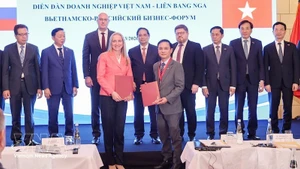 Церемония обмена документами о сотрудничестве между предприятиями Вьетнама и РФ. Фото: ВИА