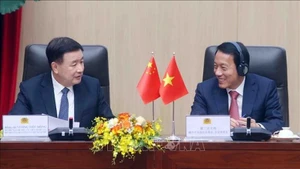 Министр общественной безопасности Вьетнама Лыонг Там Куанг и Министр общественной безопасности Китая Ван Сяохун на конференции. Фото: ВИА